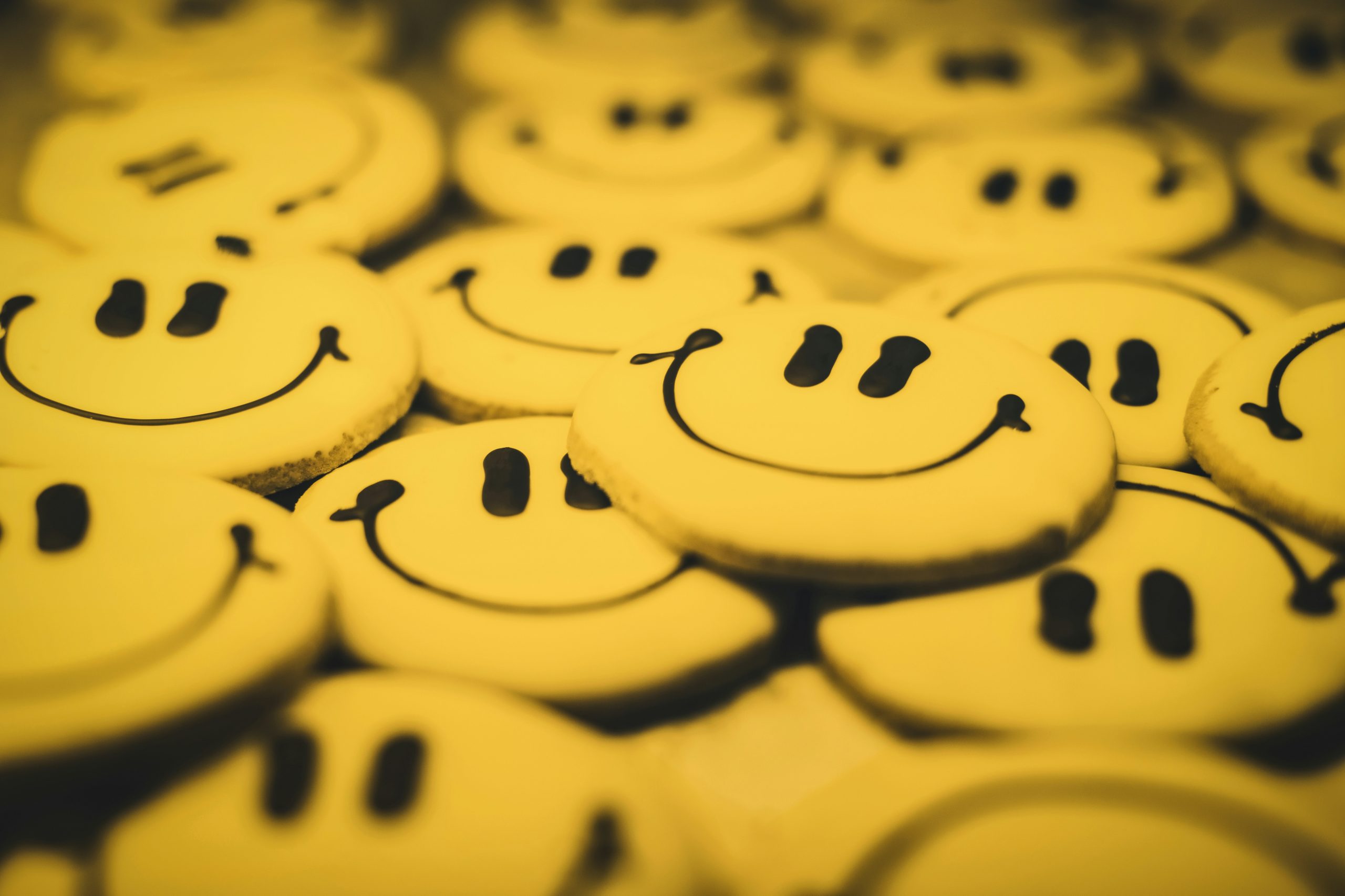 Smiley yellow face cookies! Image by Tim Mossholder via Unsplash. Thanks Tim.